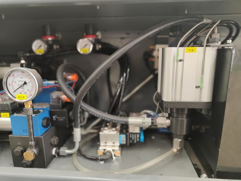 High-performance imported gas-liquid booster system in an insulating glass production line, ensuring stable pressure control and efficient sealing.